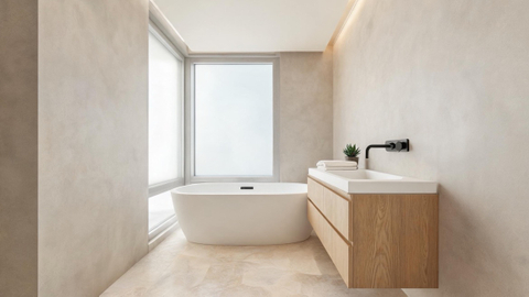 Compact Soaking Tub In Modern Small Bathroom.jpg