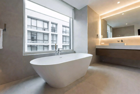 Modern Shallow Bathtub In Compact Bathroom.jpg